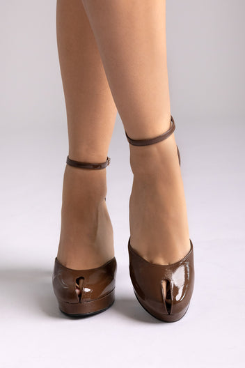 Brown patent leather ankle-strap platform pumps with block heel, rear view on a model