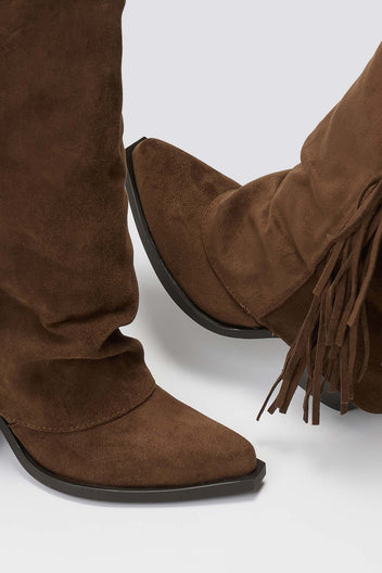 Dark brown suede fringe knee-high western boots with pointed toe, close-up detail on grey background