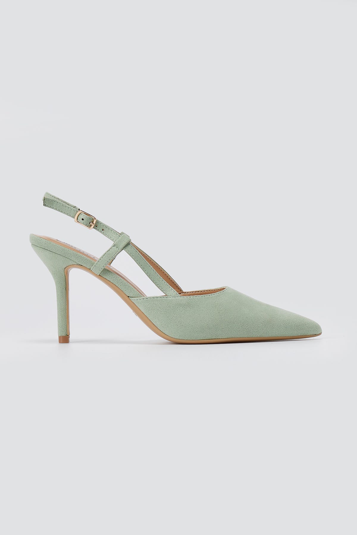 Mint green suede slingback pumps, side view, with pointed toe, thin stiletto heel and adjustable gold buckle ankle strap