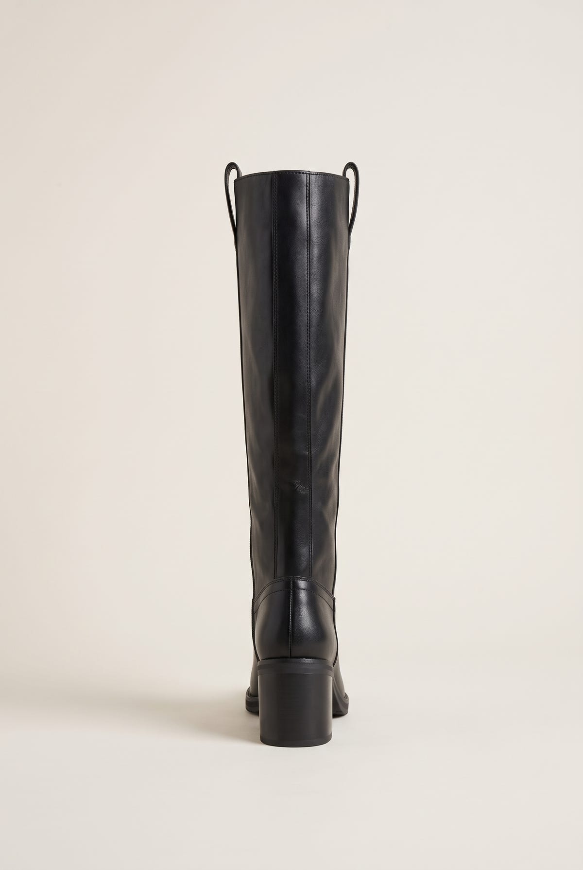 Black smooth leather knee-high boot, back view, pull loops at the top and stacked block heel