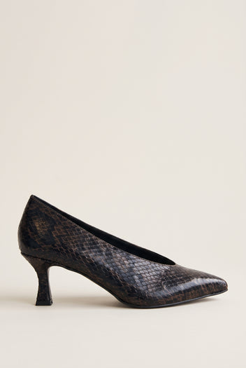 Side view of brown snake-print pointed pump with a slim kitten heel and low-cut vamp