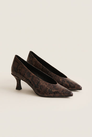 Pair of brown snake-print pointed-toe kitten heel pumps placed side by side with toes pointing right