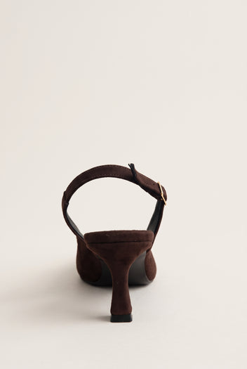Back view of brown suede slingback showing the strap across the heel and the pointed heel counter
