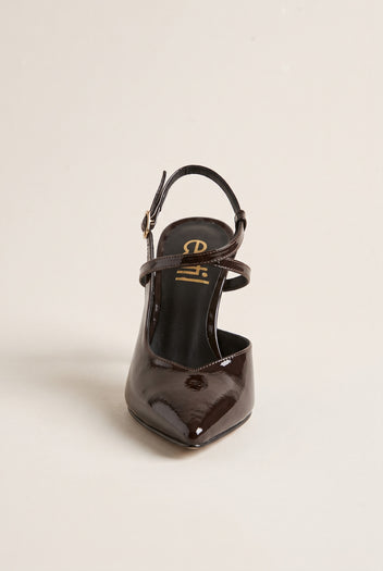 Front view of a brown patent slingback pointed pump with a thin ankle strap and open back