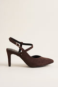 Side view of brown suede pointed toe slingback pump with thin ankle strap buckle and slender heel