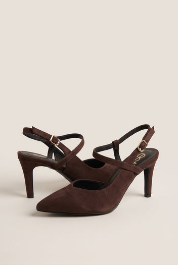 Angled pair of brown suede pointed toe slingback pumps with buckled ankle straps and slim heels