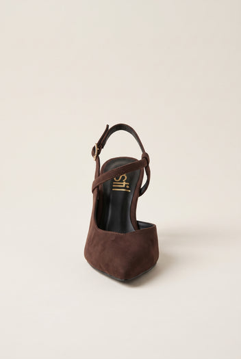 Rear angle of brown suede slingback pump with narrow ankle strap buckled over the open heel