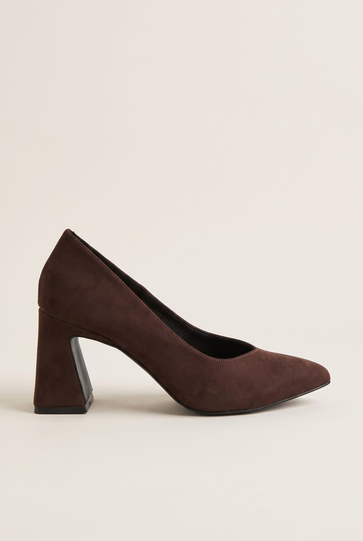 Brown suede pointed-toe pump in side profile with low-cut vamp and flared block heel