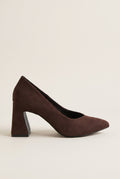 Brown suede pointed-toe pump in side profile with low-cut vamp and flared block heel