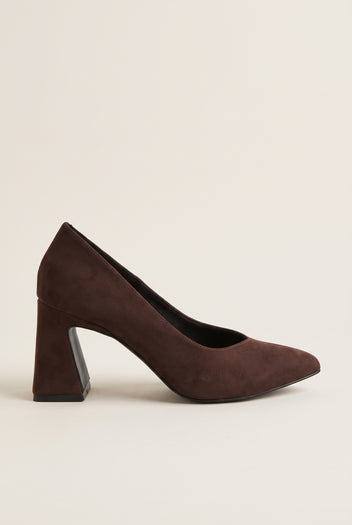 Brown suede pointed-toe pump in side profile with low-cut vamp and flared block heel