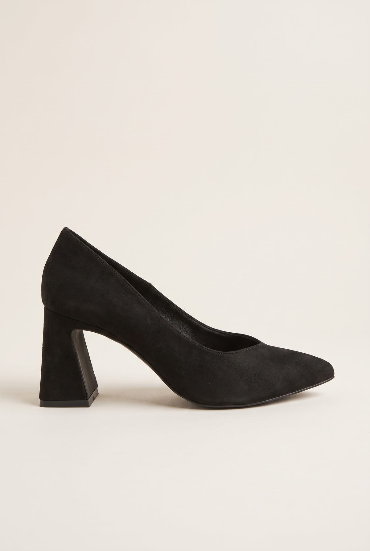 Black suede pointed-toe pump in side profile with low-cut vamp and flared block heel