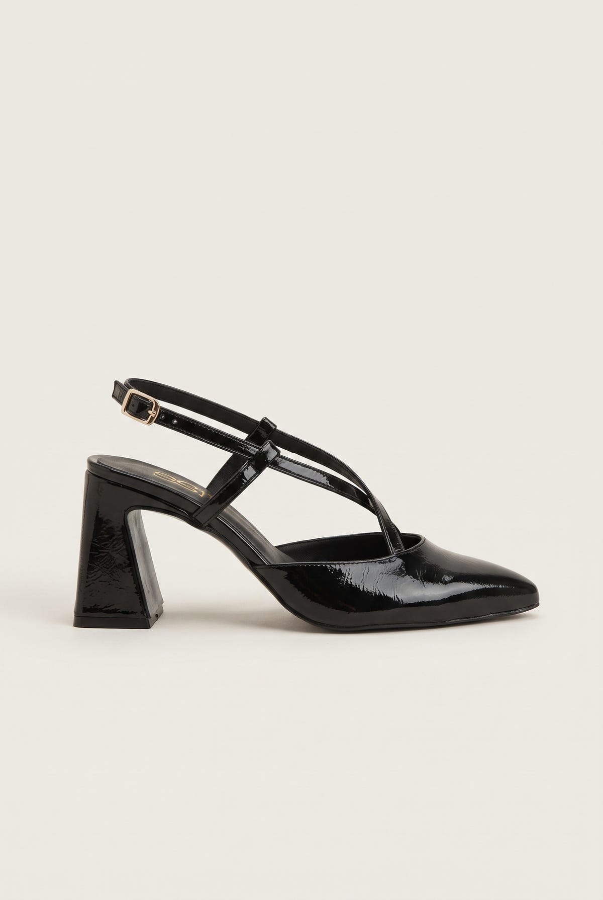 Side view of glossy black patent block heel slingback with crossed straps and pointed toe