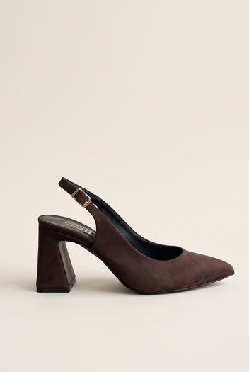 Side view of a brown suede slingback pump with a pointed toe, block heel and gold buckle on the ankle strap