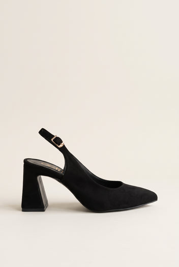 Side view of a black suede slingback pump with a pointed toe, block heel and gold buckle on the ankle strap