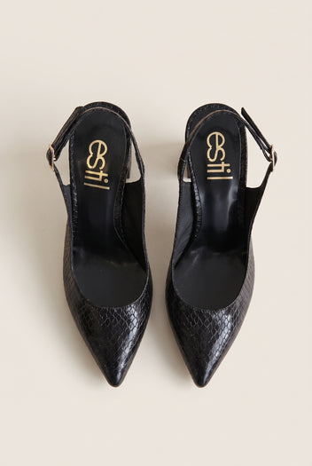 Top view of black snake-effect slingback pumps with buckled straps, pointed toes and black insoles
