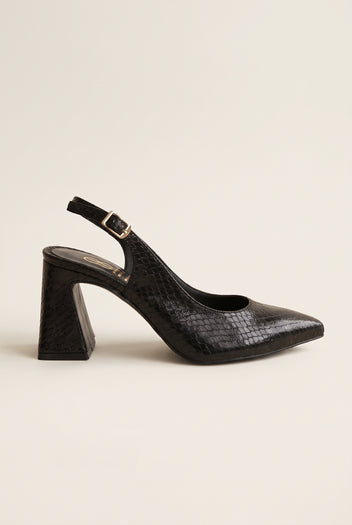 Side view of black snake-effect slingback pump with pointed toe, buckled strap and chunky block heel