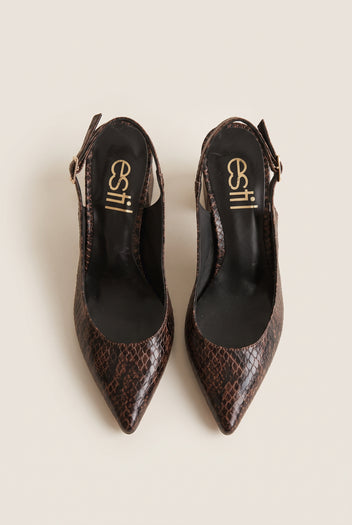 Top view of a pair of brown snake-print slingback pumps with pointed toes and dark interiors resting on a white surface