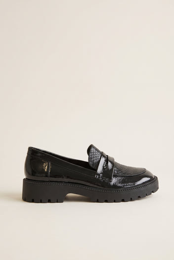 Black patent chunky loafer with snake-embossed penny strap and deep lug sole, side view