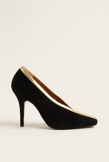 Side view of a black suede pump with a square toe, gold metallic trim along the edge and a slim stiletto heel