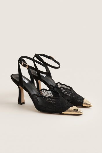 Angled pair of black lace stiletto pumps with gold-toned pointed toe caps and slim heels