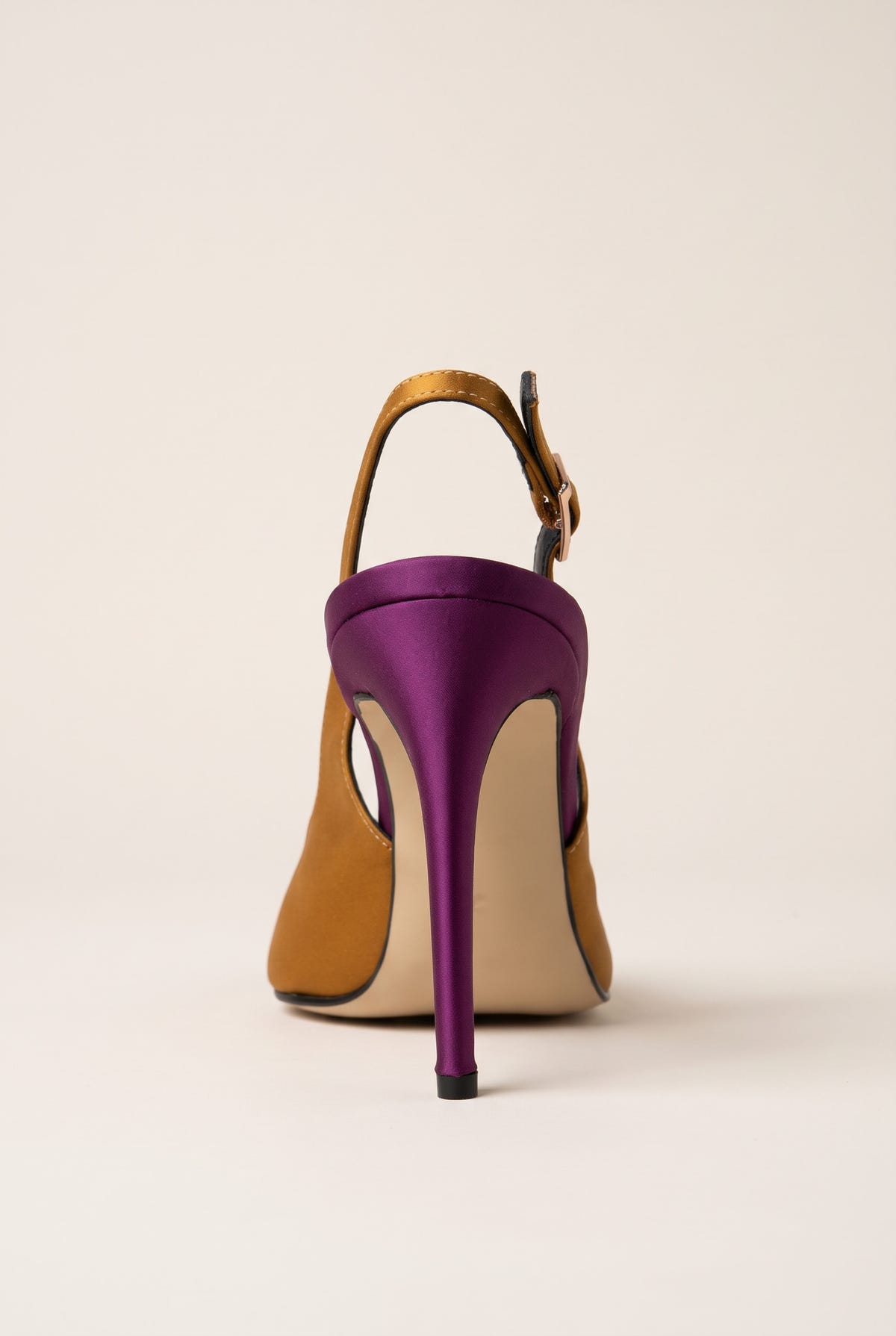 Back view of an olive satin slingback pump with a purple stiletto heel and a strap buckle at the ankle