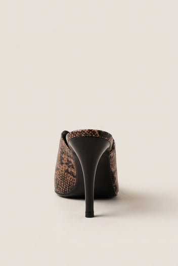 back view of one brown snake print stiletto mule with a tall slim heel and smooth black counter
