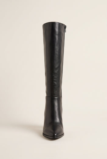 Front view of a black leather knee-high boot with pointed toe, slim shaft and side zip at the top