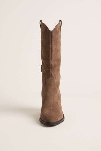 Front view of taupe suede cowboy boot with tall shaft, pointed toe and top pull tab