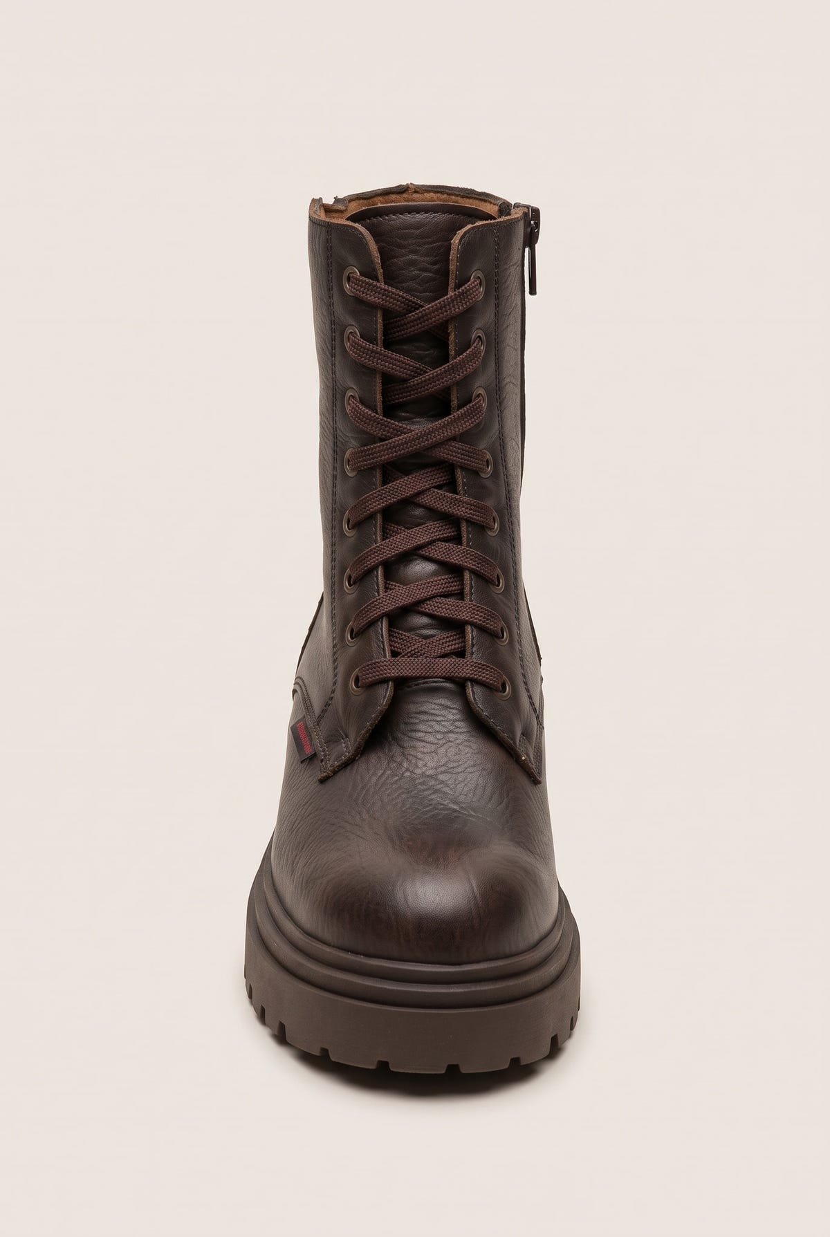 Front view of brown matte combat boot with laces running up the shaft and rounded toe