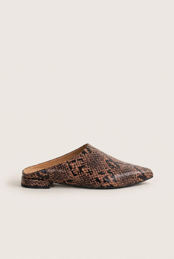 Side view of a single brown snake-effect pointed toe mule with a low flat heel and pointed tip