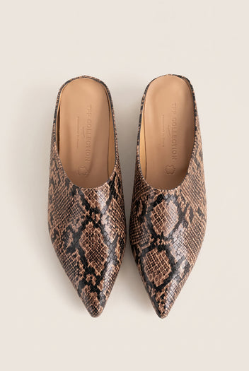 Top view of a pair of brown python snake-effect pointed toe mules with tan leather insoles