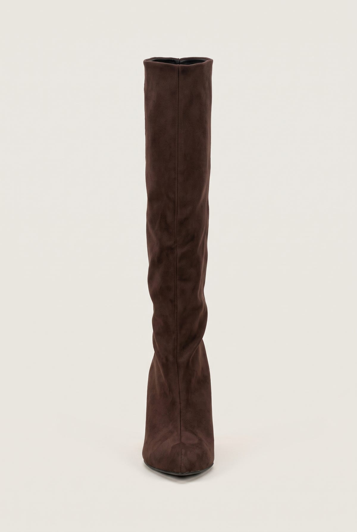 Brown suede knee-high boot standing upright showing the slim shaft and pointed toe tip, full front view