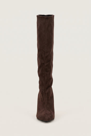 Brown suede knee-high boot standing upright showing the slim shaft and pointed toe tip, full front view
