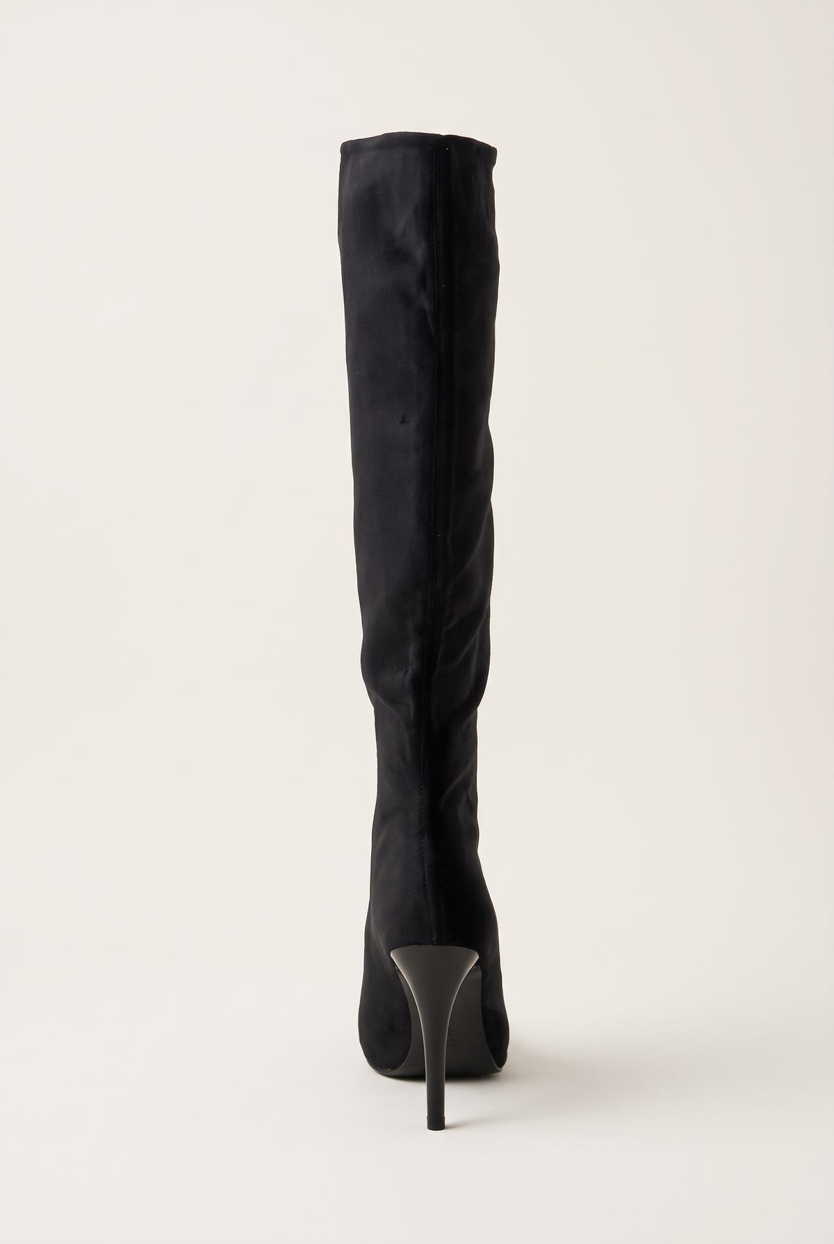 Back view of black velvet knee high boot showing the tall shaft and slim stiletto heel