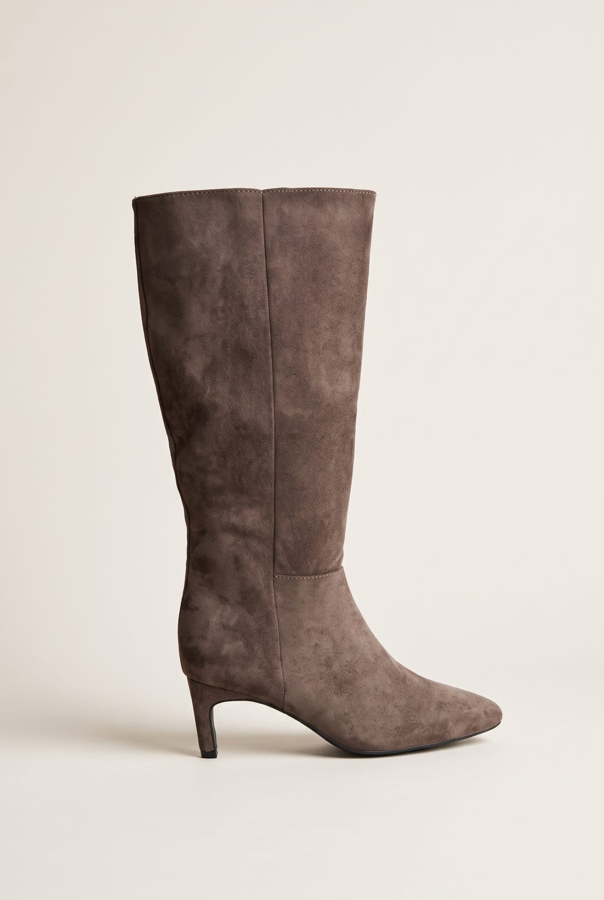Single taupe suede knee-high boot with a slim kitten heel and pointed toe, side view of the smooth tall shaft