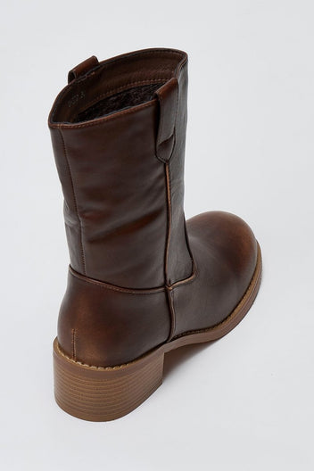 Dark brown leather mid-calf boot with round toe and block heel, angled view on a light grey background