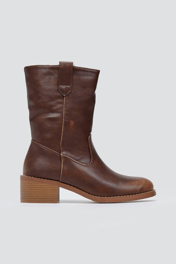 Brown leather mid-calf boot with round toe and block heel, side view on a light grey background