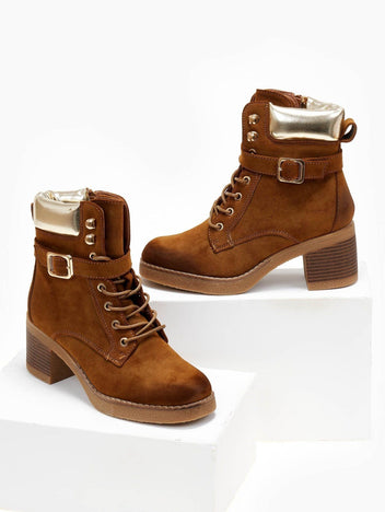 Tan suede lace-up block heel ankle boots with gold padded collar and buckle strap, front view on white blocks