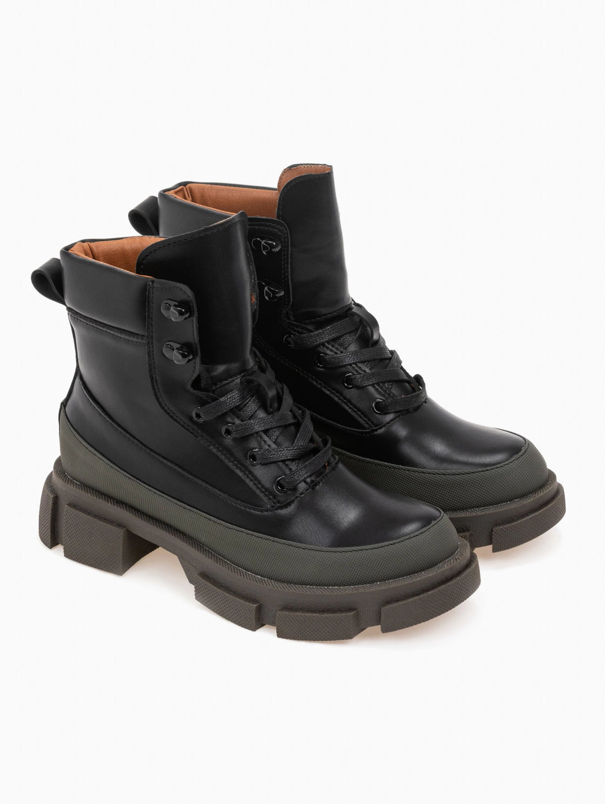Pair of black faux leather lace-up ankle boots with khaki green toe caps, tan collar lining and chunky lugged soles, front view