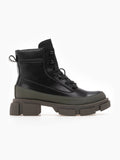Black faux leather lace-up ankle boot with khaki green rubberised toe and chunky khaki lugged sole, side view on white