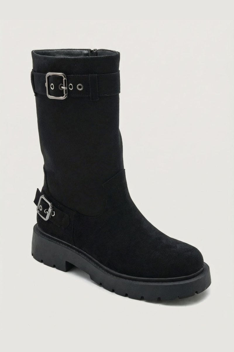 Black suede knee-high boot with buckle straps and chunky black sole, angled view on light grey background