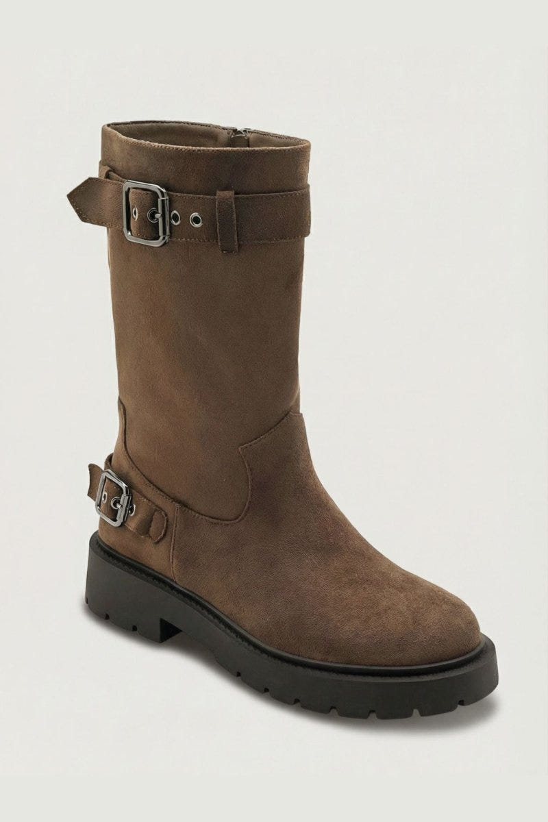 Brown suede knee-high boot with buckle straps and chunky sole, side view on light grey background