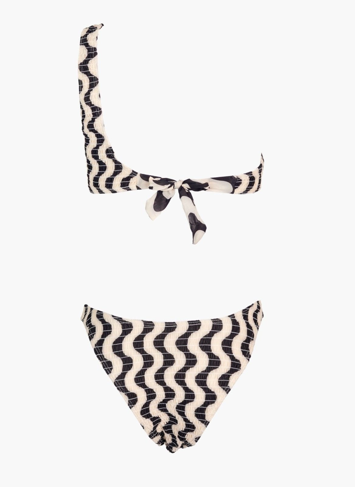 Brown and cream zigzag print one-shoulder bikini top with tie detail and printed bikini bottom, laid flat on white