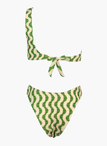 Green and cream zigzag print one-shoulder bikini top with tie detail and printed bikini bottom, laid flat on white