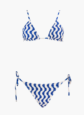 Blue and white zigzag print triangle bikini top and matching side-tie bikini bottom, laid flat on white background