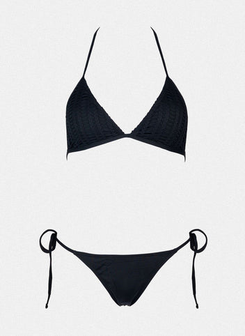 Black triangle bikini top with thin straps and black side-tie bikini bottom, laid flat on a white background