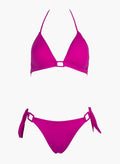 Fuchsia triangle bikini top with thin straps and fuchsia side-tie bikini bottom with ring detail, laid flat on white background