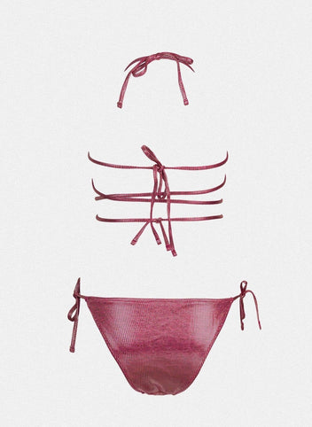 Dusty pink shimmer string bikini top with wrap straps and dusty pink side-tie bikini bottom, laid flat on white background