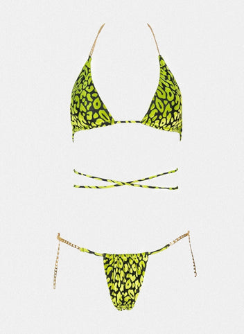 Yellow and black leopard print triangle bikini top with wrap straps and matching string bikini bottom, laid flat on white