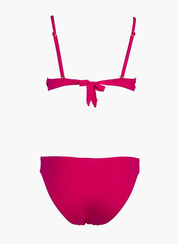 Fuchsia underwire bikini top with tie front and fuchsia bikini bottom, laid flat on white background